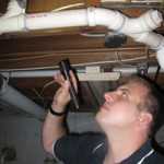 Home Inspector Checking Out Basement